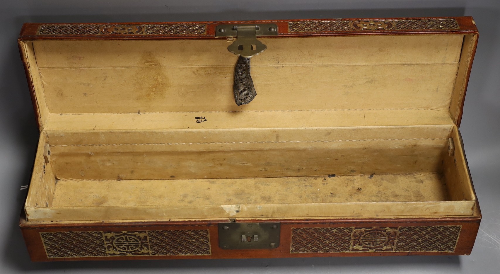 A Chinese leather covered scroll case, 52 cm wide